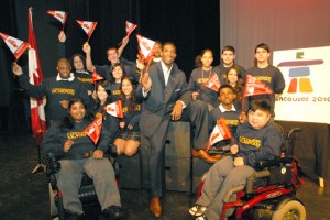 GO HARMOND GO: Senator O’Connor student Harmond DeJuan, at lower right, carried the Olympic flame in his motorized wheelchair when the torch came to Toronto. The school invited former Olympic basketball player Rowan Barrett, centre, to get students into the spirit. (FRANCIS CRESCIA/TOWN CRIER)