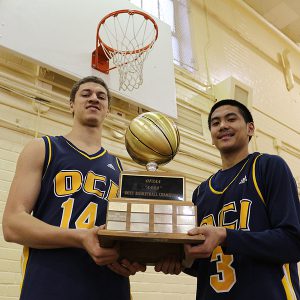 BRIAN BAKER/TOWN CRIER PROVINCIAL CHAMPIONS: Brody Clarke, left, and Calvin Epistola were two key ingredients in Oakwood Barons’ charge for provincial dominance. They won the 4A OFSAA title in boys basketball, the second time in five years for the school.