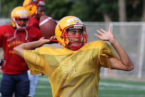 BRIAN BAKER/TOWN CRIER GO LONG: Northern Red Knights starting quarterback Assad Hussain throws to his receiver during a September practice. 