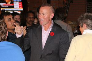 BRIAN BAKER/TOWN CRIER  IN THE DRIVER'S SEAT: Jon Burnside acknowledges supporters as he enters the Leaside Pub to celebrate his upset victory over two-term incumbent John Parker in Ward 26. Parker was the only Toronto city councillor to lose his seat in Monday's municipal election. 